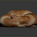 Freshly Baked Golden Croissant With Flaky Layers And Buttery Texture On Dark Background