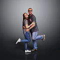 Happy Man And Woman Hugging In Gray Shirts Blue Jeans Lifting Legs On Gray Background