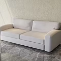 Modern Upholstered Sectional Sofa Against Light Colored Wall With Marble Floor 3d model