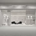 Modern Elegant Vivtoria Romantic Clothing Store With White Storefront Mannequins Black Sofas And Green Plants