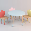 Round Light Blue Children's Table With Three Colorful Heart Shaped Backrest Chairs And Wooden Legs