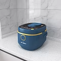 Blue Rice Cooker Kitchen Appliance On White Countertop With Marble Wall Tiles