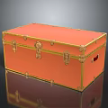 Vintage Orange Storage Trunk With Gold Latches And Decorative Metal Trim