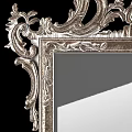 Two Ornate Vintage Carved Mirrors With Intricate Decorative Frame Design