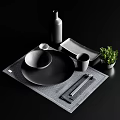 Stylish Black Gray Dinnerware Set Featuring Bowls Plates Cups Placemats And Greenery