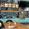 Light Blue Street Food Truck With Coca-Cola Cooler Chalkboard Menu And Wooden Tables Benches