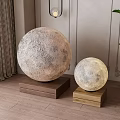 Large And Small Moon Textured Spherical Floor Lamps With Wooden Base In Home Interior