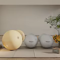 Fitness Equipment Set With Yellow And Gray Exercise Balls Dumbbells On Yoga Mat