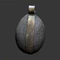 Metallic Textured Oval Household Item With Two Ring Decorations On Top