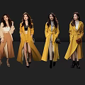 Women in Stylish Yellow Beige Brown Coats Standing Against Black Background With Reflections
