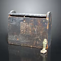 Ancient Wooden Chest With Carved Symbols And Small Figurine Decoration