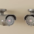 Dual Surveillance Cameras With Silver Metal Housing For Security Monitoring