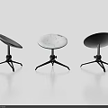 Three White Circular Electronic Devices With Black Tripod Stands And Modern Design