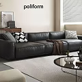 Modern Leather Sofa And Glass Coffee Table Set With Decorative Pillows And Tabletop Ornaments