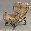 Natural Wicker Outdoor Chair With Comfortable Woven Design And Sturdy Dark Brown Frame