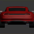 Red Two Door Sports Car With Sleek Design And Silver Alloy Wheels