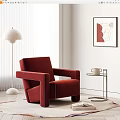 Red Velvet Armchair In Living Room With Floor Lamp Side Table And Wall Art