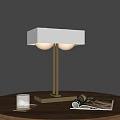 Modern Table Lamp With Square Shade Two Round Bulbs On Wooden Table With Magazines And Glass Tray