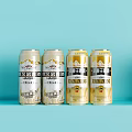Four Zhujiang Wang Alcohol Free Beer Cans on Light Blue Background
