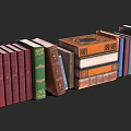 Vintage Books Collection With Varied Colors And Decorative Covers Stacked Neatly
