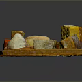 Assorted Cheese Platter With Various Shapes Colors On Wooden Board Including Ham Slices