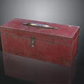Red Metal Toolbox With Worn Surface Lock And Metal Handle