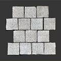 Stacked Gray Natural Stone Blocks With Textured Surface And Decorative Arrangement