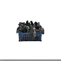 Recycled Daily Necessities In Blue Plastic Basket Filled With Old Cloths And Bottles