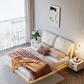 Double Bed With White Headboard Brown Blanket Pink Pillows Framed Painting Sunlight And Sea View