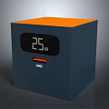 Cube Shaped Electronic Device With Orange Top Dark Blue Body 25w Display And Charging Port