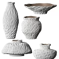 White Textured Ceramic Vessels With Artistic Design And Various Shapes For Home Decor