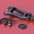 Black Metal Mechanical Bracket With Ring Shaped Part And Circular Toothed Component On Red Background