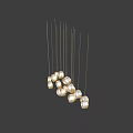Golden Irregular Circular Pendant Lights with Transparent Shades Hanging in Modern Interior