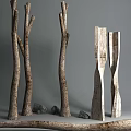 Natural Wood And Stone Decorative Pieces With Tree Trunks And Carved Blocks