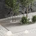 Modern Garden Ornament Arrangement With Lush Green Trees Shrubs Dark Textured Wall And Concrete Platform