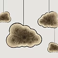 Elegant Textured Beige Cloud Shaped Pendant Lights Hanging On White Background