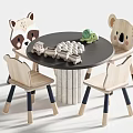 Kids Table with Animal Shaped Wooden Chairs and Toys on Black Tabletop