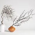 Bonsai Plants in White and Orange Ceramic Vases with Slender Bare Branches for Minimalist Decor