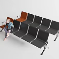 Public Waiting Area Metal Chairs With Black And Brown Seats Arranged In Rows