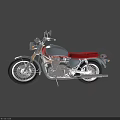 Classic Vintage Motorcycle With Red Seat Silver Body And Spoked Wheels