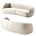 Beige Curved Two Seater Sofa With Soft Fabric And Brown Decorative Pillow