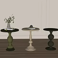 Elegant Round Side Tables with Ornate Bases in Green Cream and Dark Green Tones