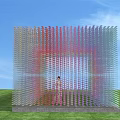 Colorful Transparent Pergola With Glass Panels And Standing Figure On Green Grass Under Blue Sky