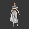 Stylish Woman In Striped Top And Patterned Skirt With Belt Standing Against Grey Background