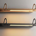 Two Modern Metal Wall Sconces In Gold And Black With Sleek Design And Warm Light