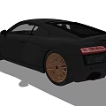 Audi Black Sports Car With Sleek Exterior Design And Gold Alloy Wheels