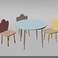 Round Light Blue Children's Table With Three Colorful Heart Shaped Backrest Chairs And Wooden Legs