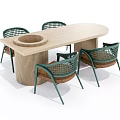 Oval Wooden Dining Table Set With Circular Indentation And Four Green Frame Woven Chairs