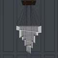 Elegant Modern Crystal Chandelier With Multi-layered Linear Design Hanging On Dark Wall