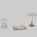 Elegant Table Lamp With Open Book And Decorative Figurine In Reading Nook